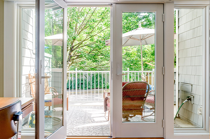 Contemporary open living space with folding-style glass openings