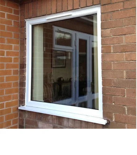Modern fixed glass window framing natural light